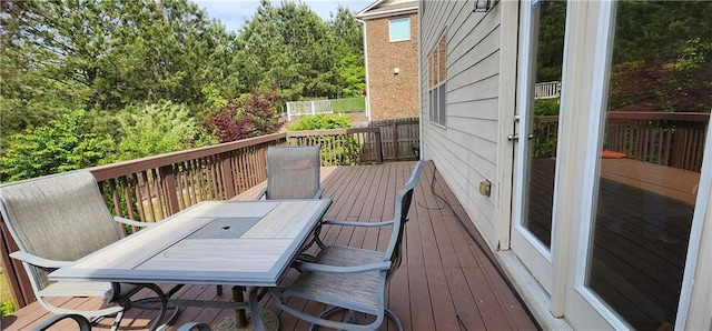 570 Eldridge Dr, Suwanee, GA 30024 - wooden deck with outdoor dining area
