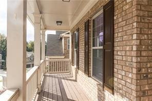 570 Eldridge Dr, Suwanee, GA 30024 - balcony featuring a porch