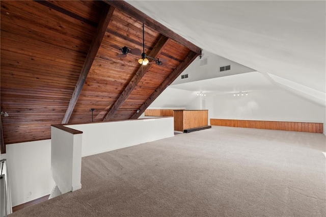 bonus room with carpet flooring, wooden ceiling, vaulted ceiling with beams, and visible vents