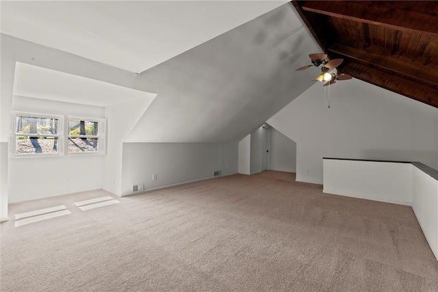 bonus room with visible vents, ceiling fan, carpet, and lofted ceiling