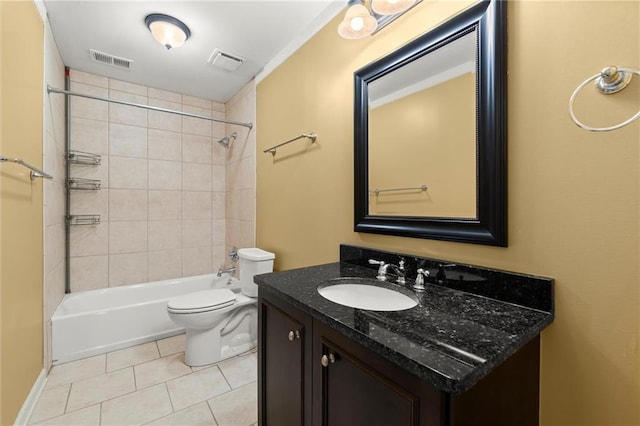 bathroom with vanity, toilet, visible vents, and tile patterned flooring