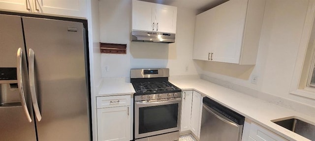 kitchen featuring white cabinetry, appliances with stainless steel finishes, and sink