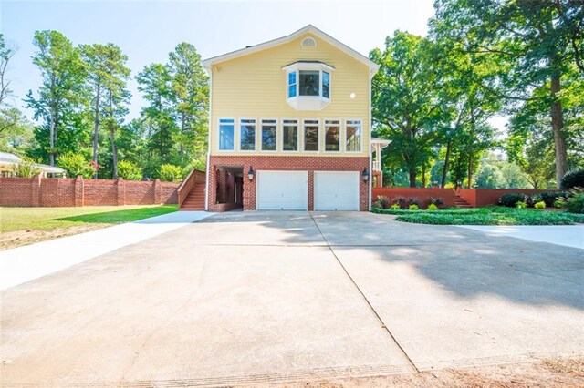 front of property with a garage