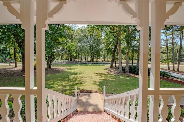 view of yard with covered porch