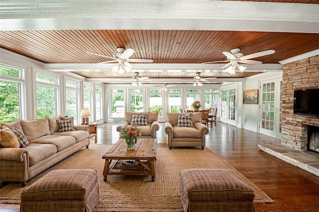 living room with a fireplace, light wood-type flooring, wooden ceiling, ceiling fan, and french doors