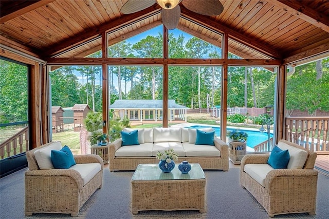 sunroom / solarium featuring ceiling fan, vaulted ceiling, and wooden ceiling