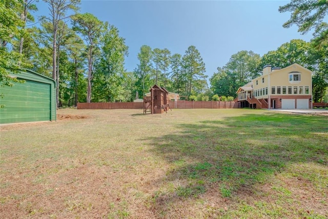 view of yard featuring a garage