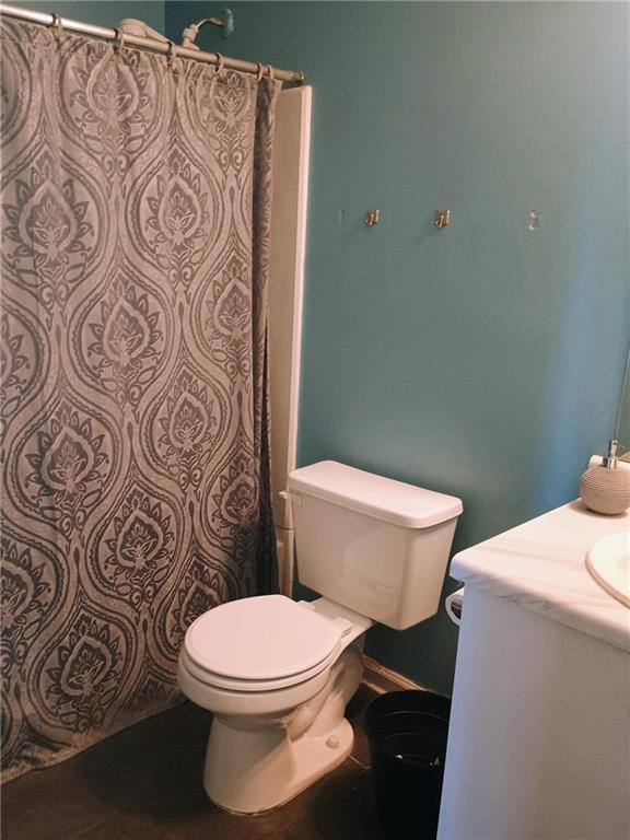 bathroom with vanity and toilet