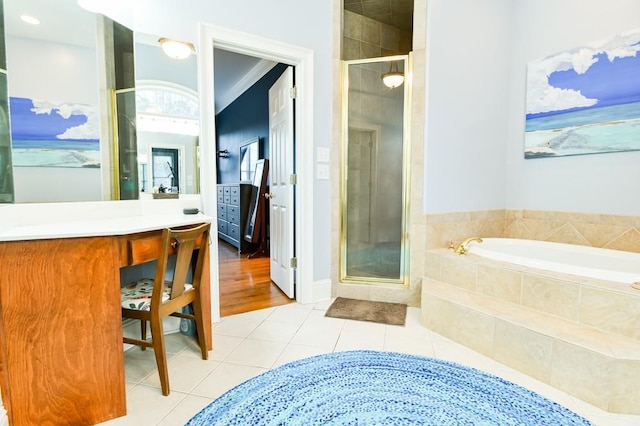 bathroom with vanity, tile patterned floors, and independent shower and bath