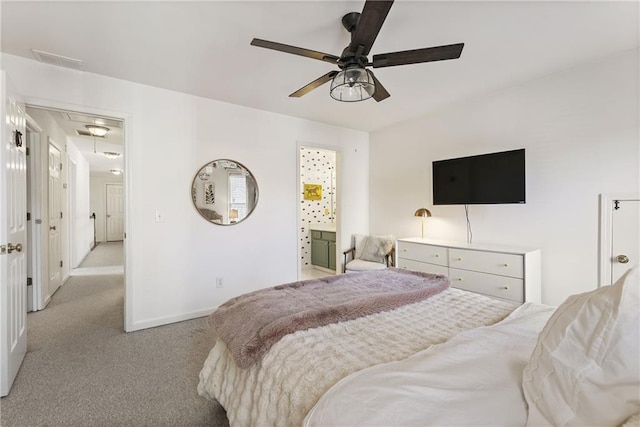 bedroom with a ceiling fan, baseboards, visible vents, attic access, and light carpet