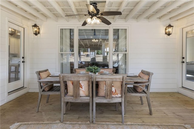 exterior space with outdoor dining area and a ceiling fan