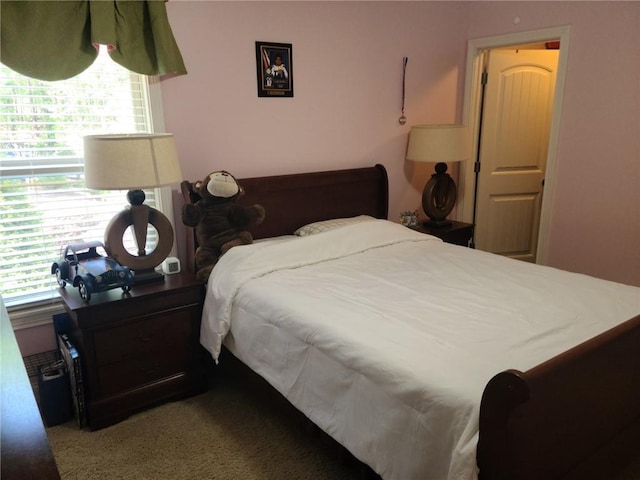 bedroom featuring multiple windows