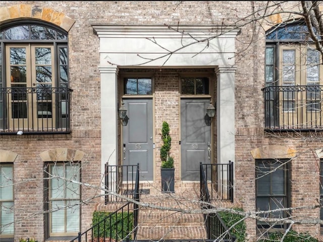 property entrance featuring french doors