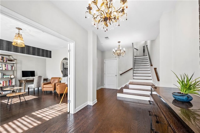 foyer entrance with a notable chandelier, dark wood-style flooring, visible vents, baseboards, and stairs