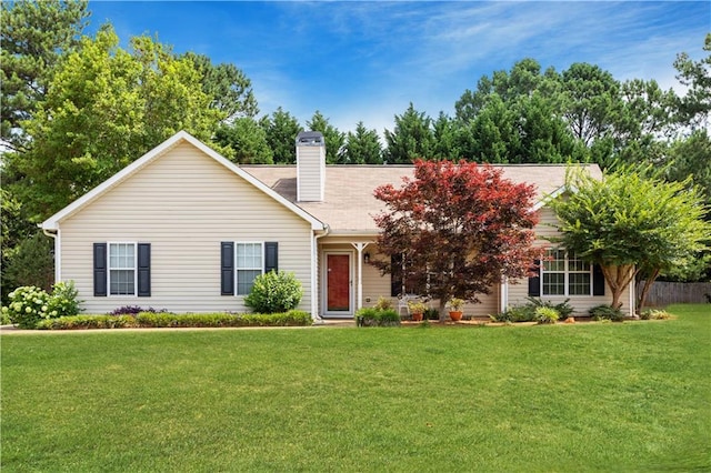 view of front of property with a front lawn