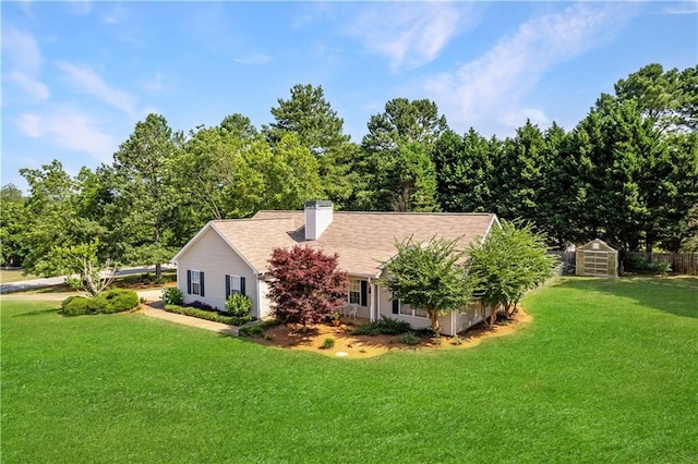 view of property exterior featuring an outbuilding and a lawn