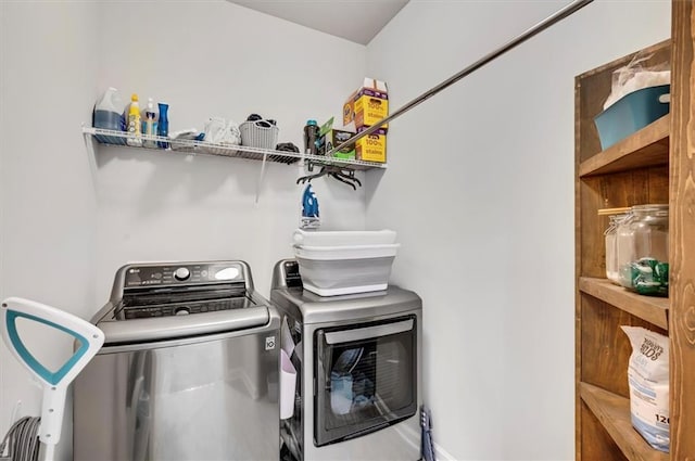 clothes washing area featuring washing machine and dryer