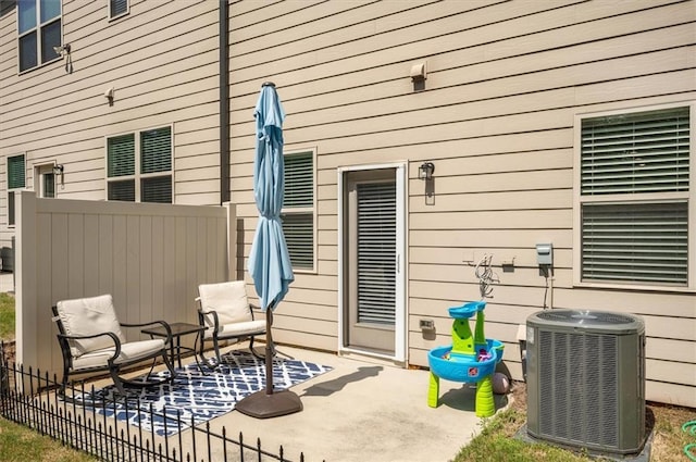 view of patio with central AC unit