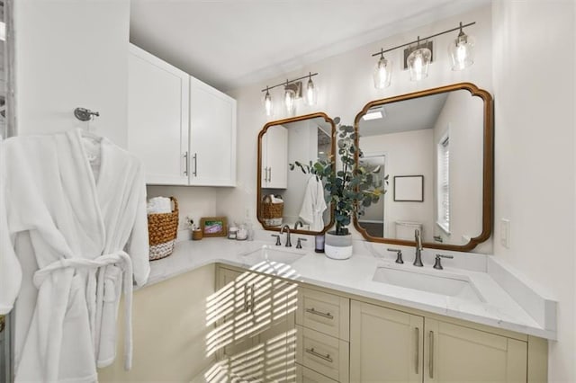 full bath featuring a sink and double vanity