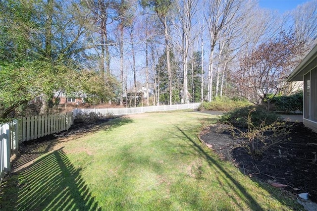 view of yard featuring fence