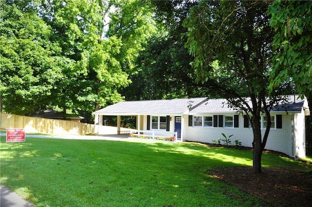 136 Rosewood Dr, Dallas, GA 30132 - ranch-style home with brick siding and a carport