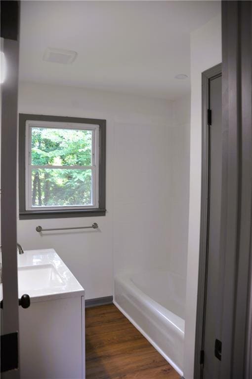 136 Rosewood Dr, Dallas, GA 30132 - full bathroom featuring vanity and wood finished floors
