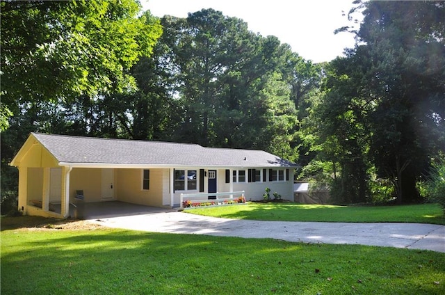 136 Rosewood Dr, Dallas, GA 30132 - ranch-style house with driveway, a front yard, and an attached carport