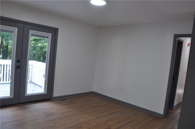 136 Rosewood Dr, Dallas, GA 30132 - unfurnished room with french doors and dark wood finished floors