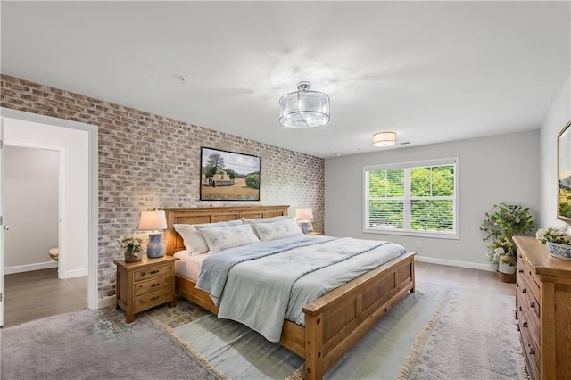 355 Niles Ct Unit 2, Marietta, GA 30060 - bedroom with baseboards and brick wall