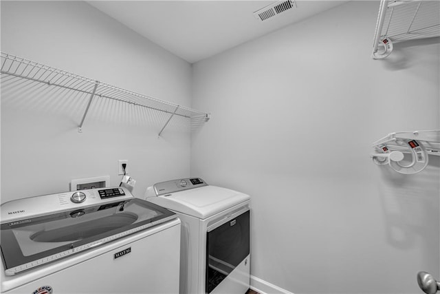 355 Niles Ct Unit 2, Marietta, GA 30060 - laundry area with independent washer and dryer, laundry area, visible vents, and baseboards