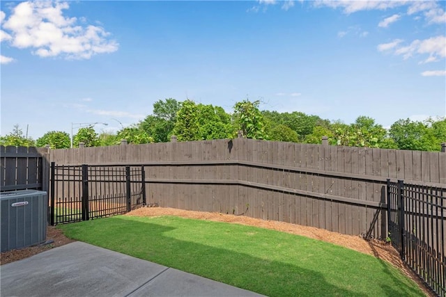 355 Niles Ct Unit 2, Marietta, GA 30060 - view of yard with central AC and a fenced backyard