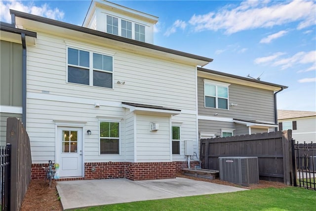 355 Niles Ct Unit 2, Marietta, GA 30060 - rear view of house with fence, central AC unit, and a patio area