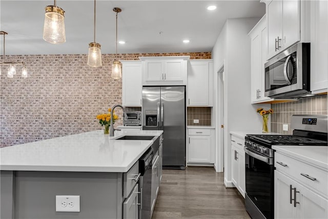 355 Niles Ct Unit 2, Marietta, GA 30060 - kitchen with light countertops, gray cabinetry, appliances with stainless steel finishes, and tasteful backsplash