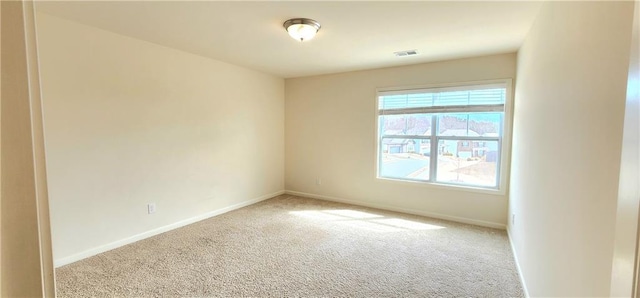 view of carpeted spare room