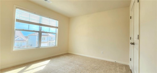 view of carpeted spare room