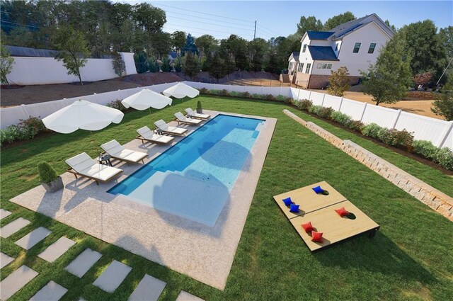 wooden terrace featuring area for grilling and a swimming pool