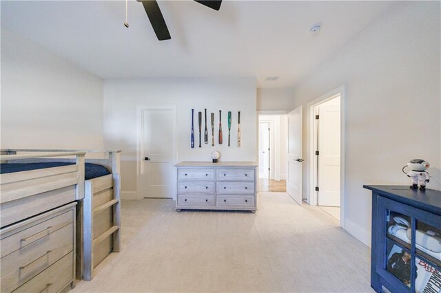 carpeted office with ceiling fan