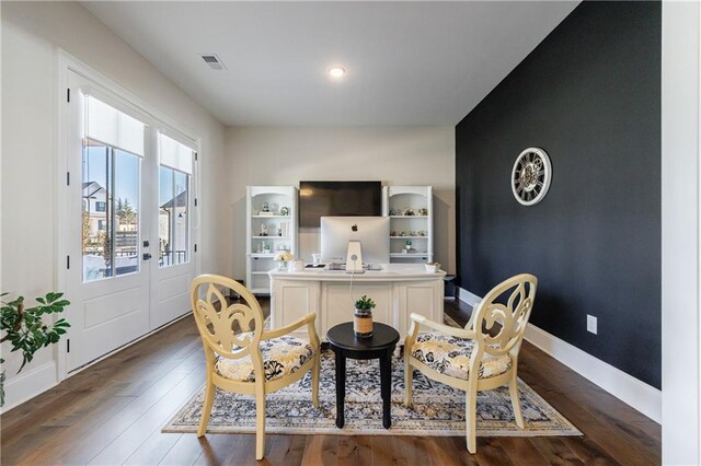 interior space with crown molding and hardwood / wood-style floors