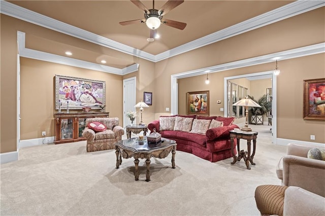 living room with carpet, ornamental molding, and baseboards