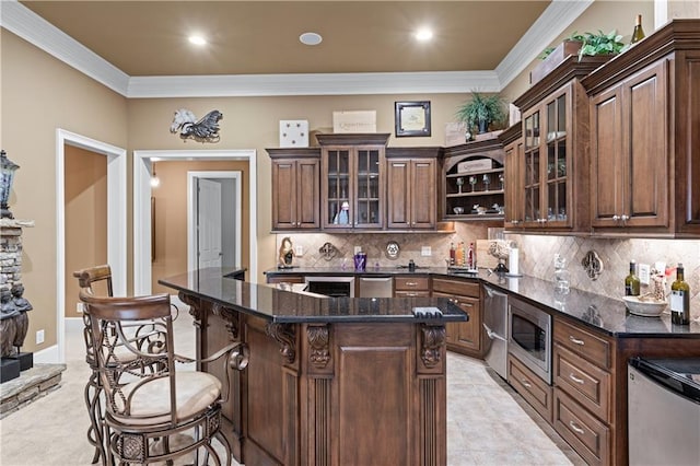 kitchen featuring stainless steel appliances, a breakfast bar, ornamental molding, decorative backsplash, and open shelves