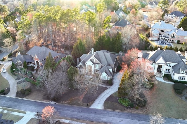 birds eye view of property with a residential view