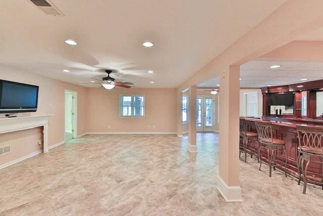 living room featuring ceiling fan