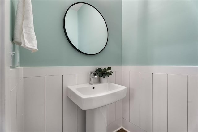 2347 Hosea L Williams Dr NE Unit 11, Atlanta, GA 30317 - bathroom with wainscoting and a sink