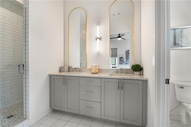 2347 Hosea L Williams Dr NE Unit 11, Atlanta, GA 30317 - bathroom featuring a stall shower, double vanity, tile patterned flooring, and ceiling fan
