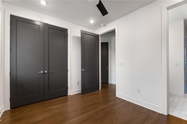 2347 Hosea L Williams Dr NE Unit 11, Atlanta, GA 30317 - unfurnished bedroom with dark wood-style floors, a closet, and ceiling fan