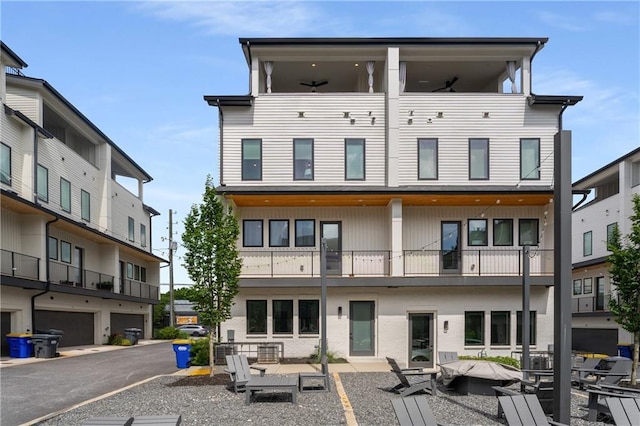 2347 Hosea L Williams Dr NE Unit 11, Atlanta, GA 30317 - back of house featuring a balcony and a ceiling fan