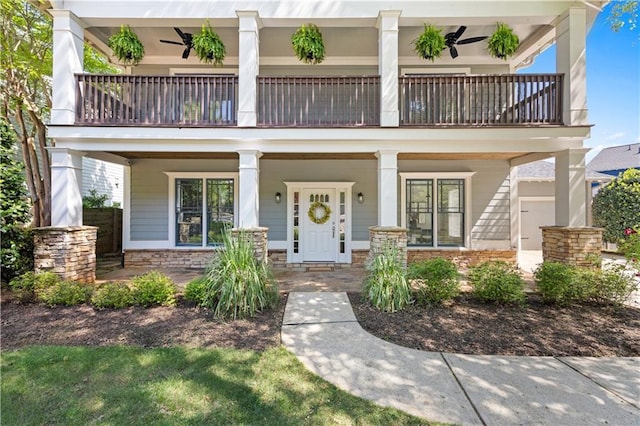 view of front of home featuring a porch and a balcony