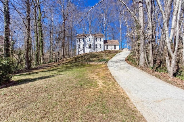 exterior space with a front lawn