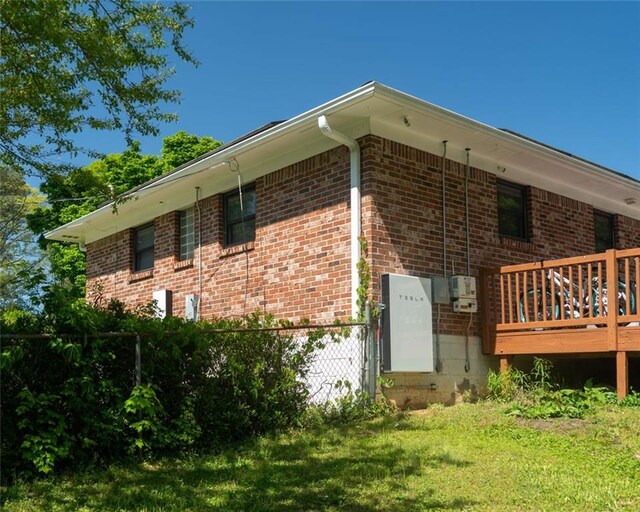 724 Camelot Way, Norcross, GA 30071 - view of property exterior featuring brick siding and a deck