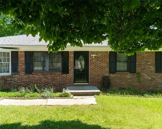 724 Camelot Way, Norcross, GA 30071 - entrance to property featuring brick siding and a lawn